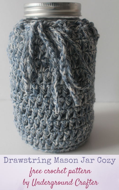 Free crochet pattern: Drawstring Mason Jar Cozy in Wool and the Gang Billie Jean by Underground Crafter | This cozy makes the perfect gift wrap for a jar mix gift. It’s also a great cover for reused mason jars with label remnants. The drawstring allows you to gather it closed for both wide and regular mouth jars. It's just one of 9 crafty projects paired with cookie recipes for the (Inter)National Cookie Month Crafty Blog Hop!