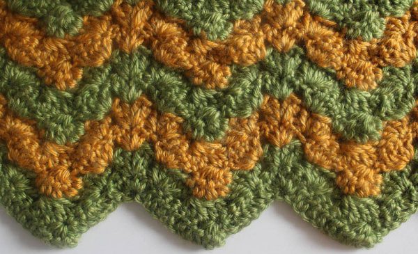 Triplet Ripple Baby Blanket, free crochet pattern with video tutorial in Lion Brand Heartland yarn by Underground Crafter | Trios of increases make a stunning ripple blanket with wide, gently curved peaks and deep, pointy valleys.