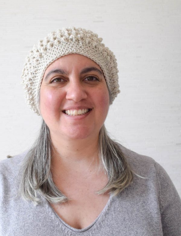 Free crochet pattern: Mock Bobbles Beret in Sprightly Acrylic Worsted yarn by Underground Crafter | This textured beret is made with a combination of tall and short crochet stitches. Available in infant, child, and adult sizes.