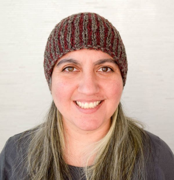 Free knitting pattern: Yukon Beanie by Underground Crafter | This beginner-friendly stranded knitting project features eye-catching vertical stripes. 