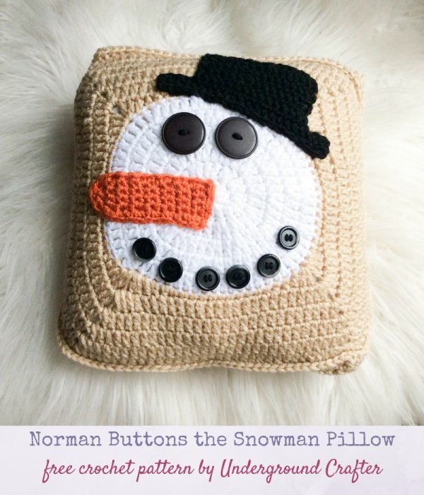 Free crochet pattern: Norman Buttons the Snowman Pillow by Underground Crafter